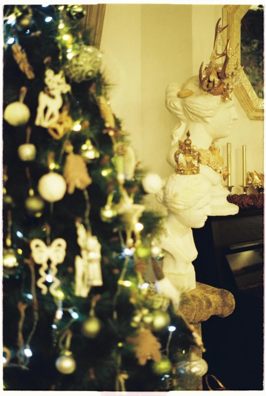 a table with a decorated christmas tree on top