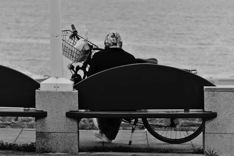 there are people that are sitting on this bench