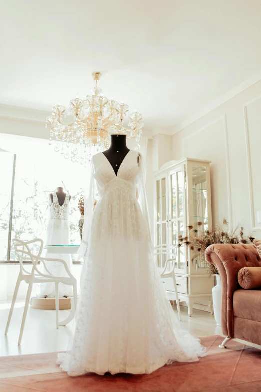 a dress is shown in the middle of the room