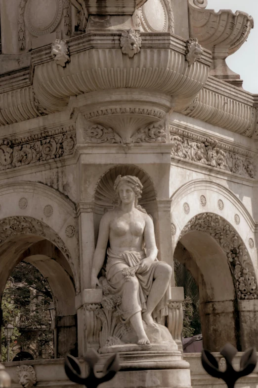 an elaborate monument with a statue in the center