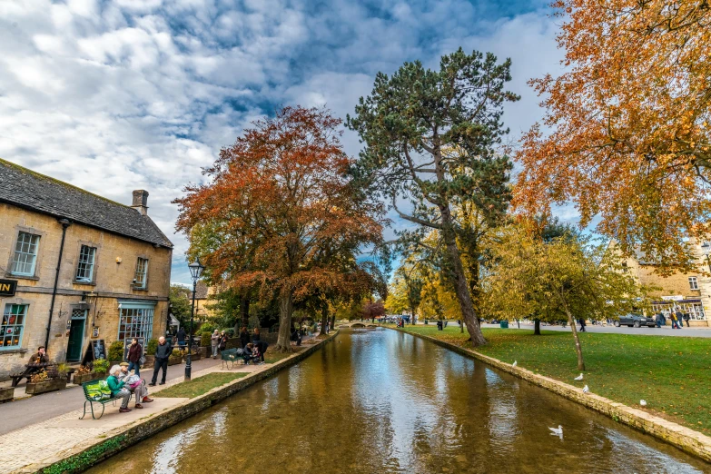 a small canal running through a city center