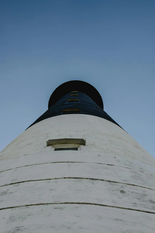 a building with two small round windows at the top