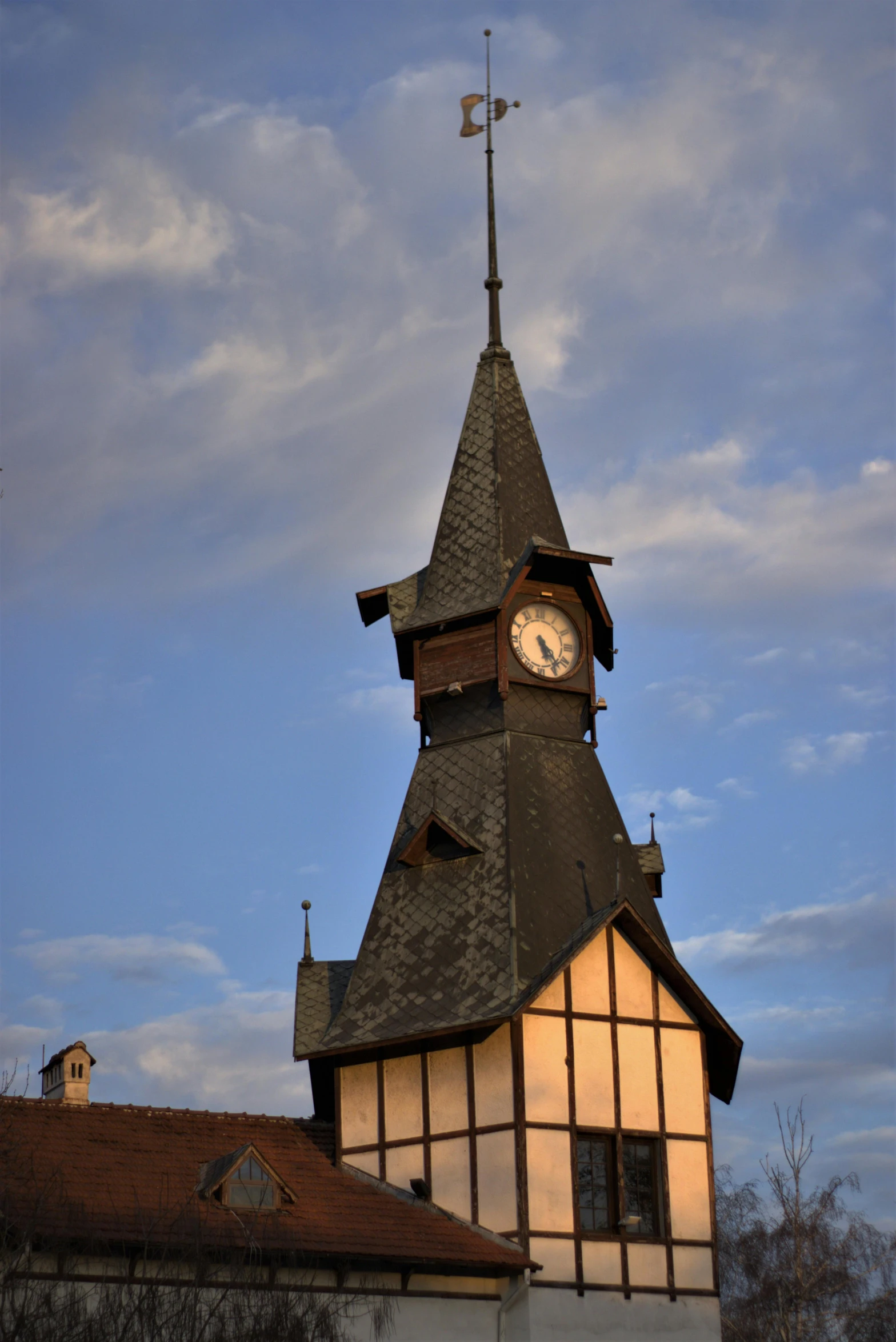 a church with a clock on the roof