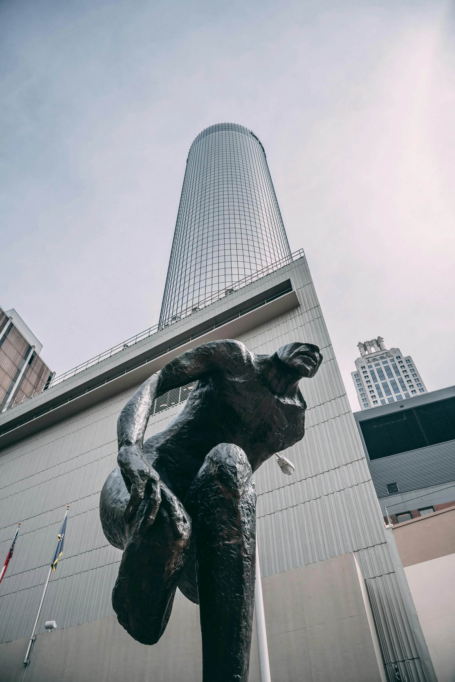 a statue of an elephant in front of a large building