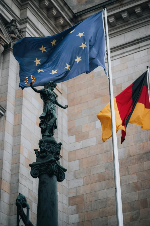 an image of two flags and the european flag