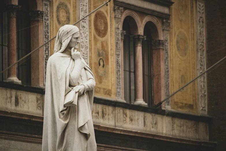 a statue of mary is shown on the corner