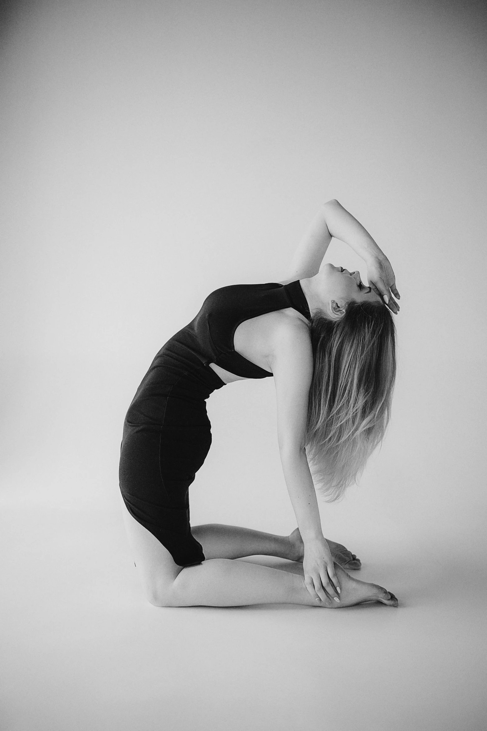 woman in a studio doing yoga