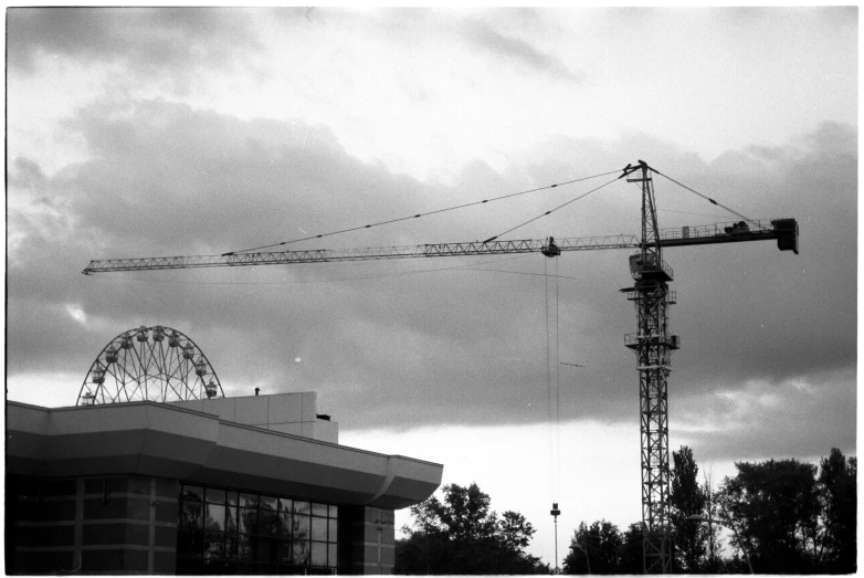 a large crane sitting in the middle of the street