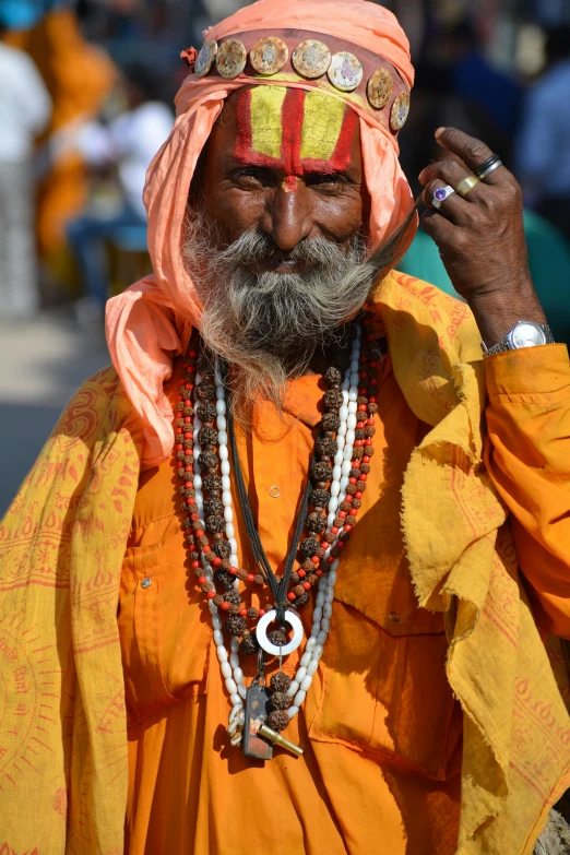 a man with long ids and a turban