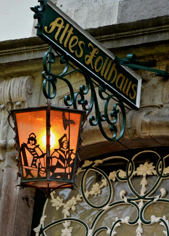 a lamp is attached to the outside wall of a building