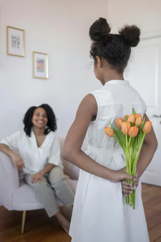 an image of a woman with flowers in her hand