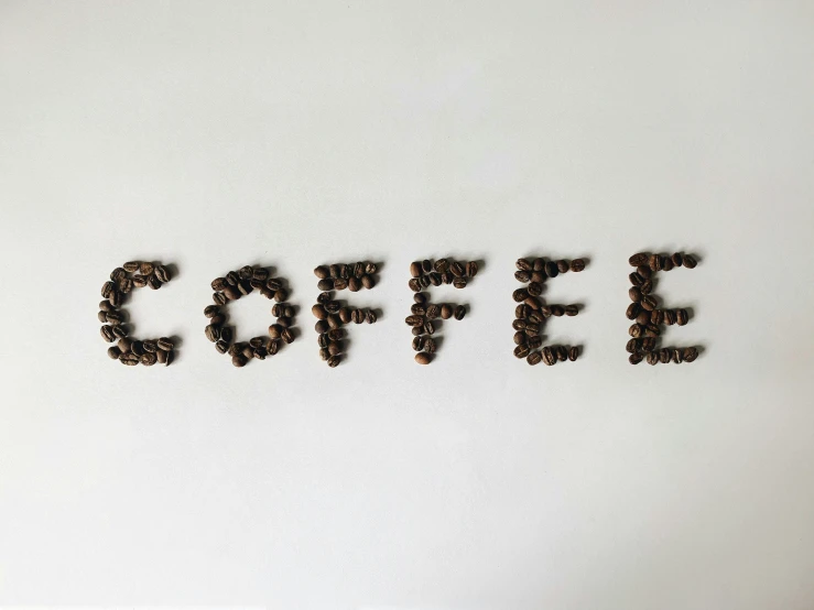 a sign that has been made to spell coffee