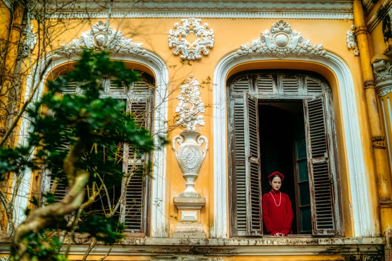 a person that is standing in the window