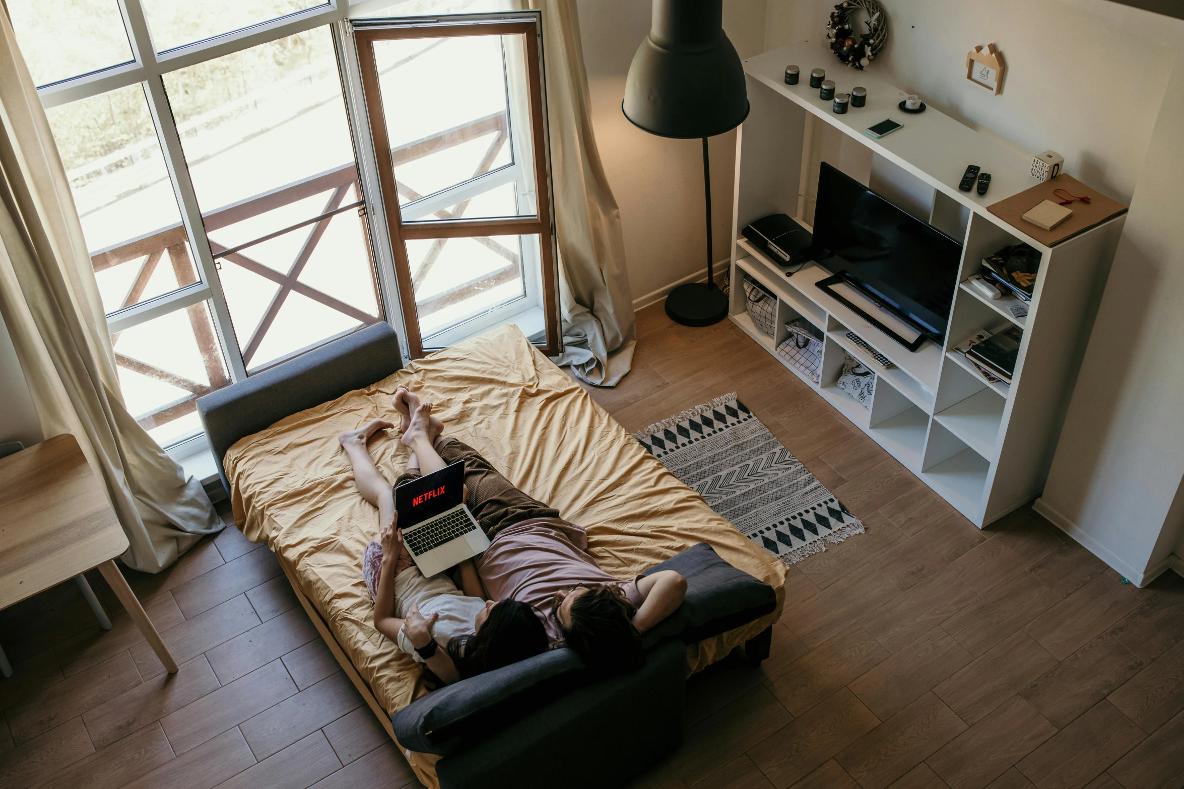 a person is on the floor in a living room