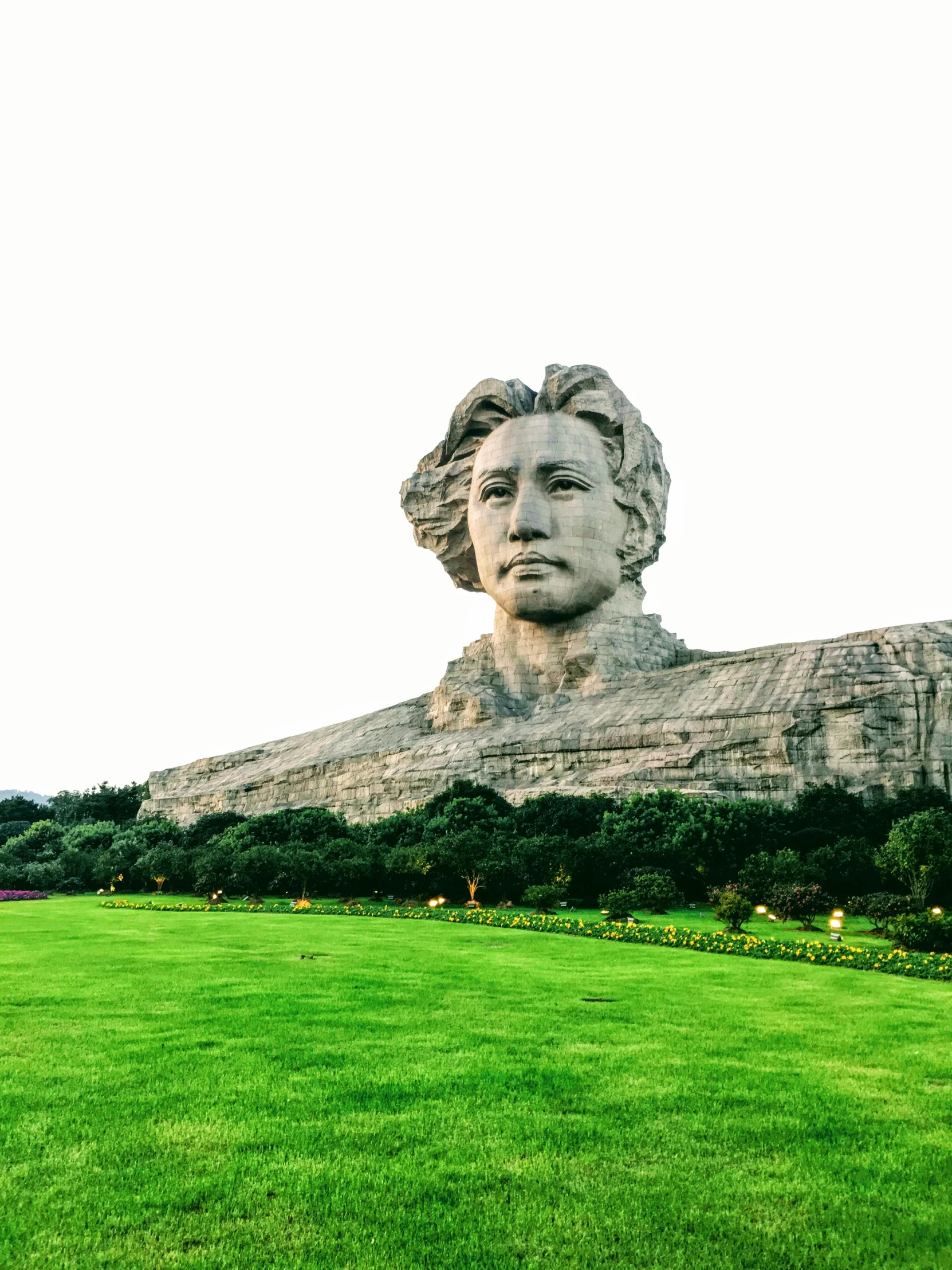 a huge statue with a large face on it