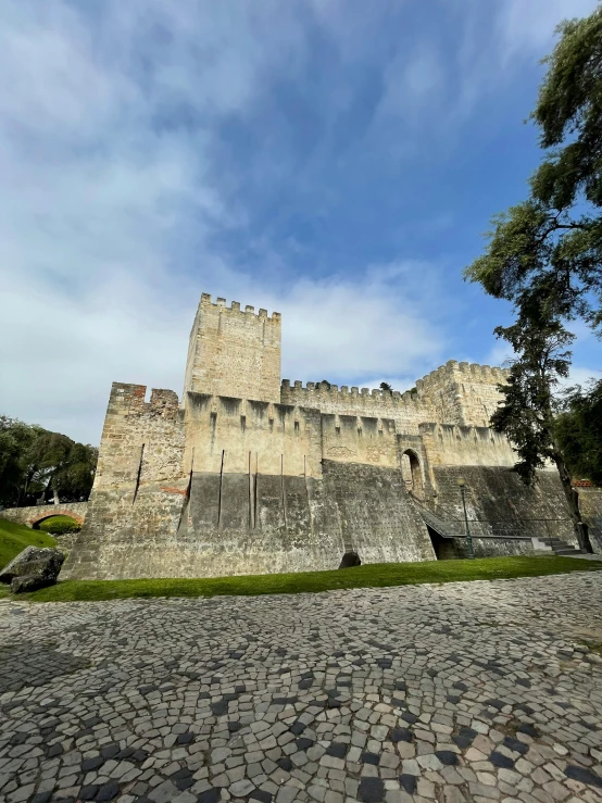 an image of a castle like building from the street