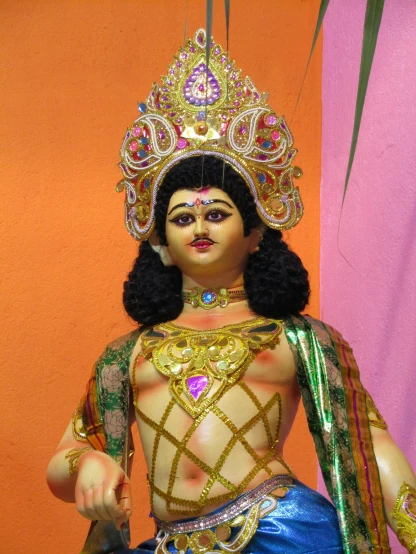 a statue of an indian god on display