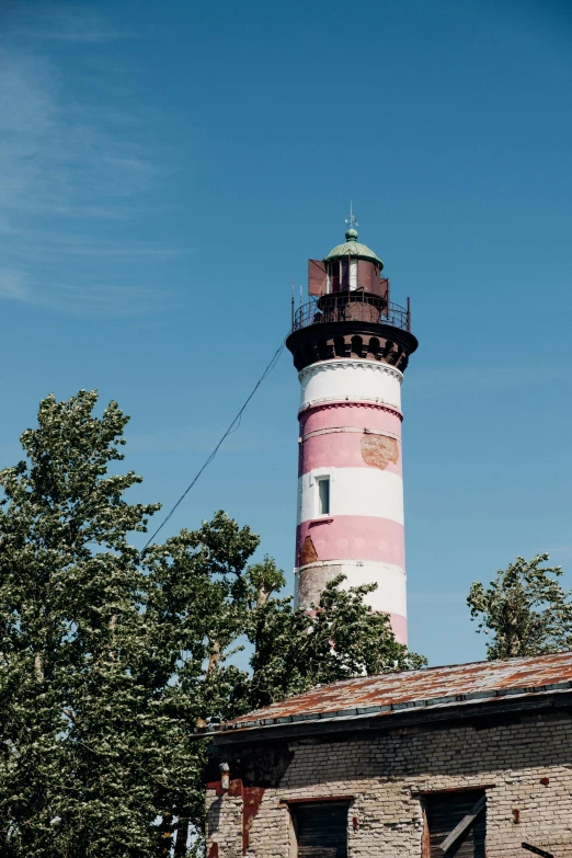 an old lighthouse tower sitting on top of a building