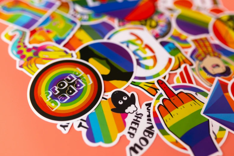 rainbow sticker assortment with the words happy birthday and icons