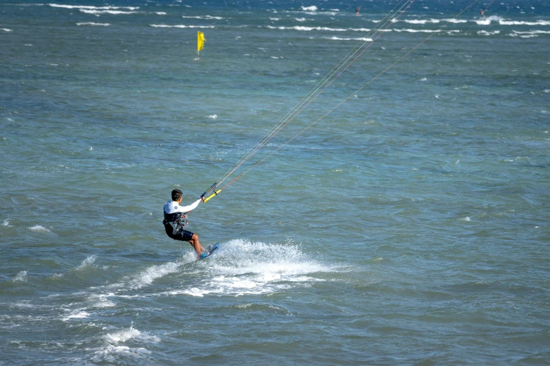 a man is holding on to his line and being pulled