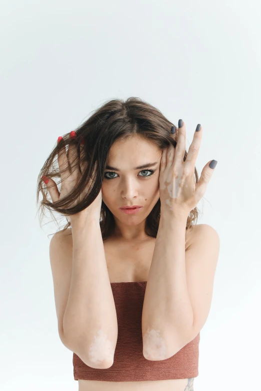 an attractive woman with freckles covering her body