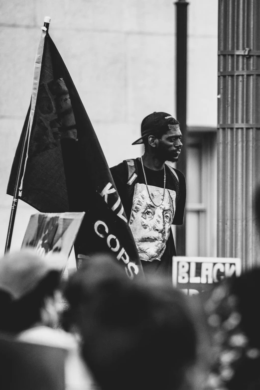 a man with some black and white flags