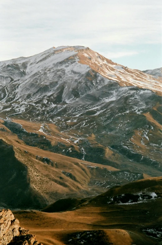 mountains in the distance with snow on them