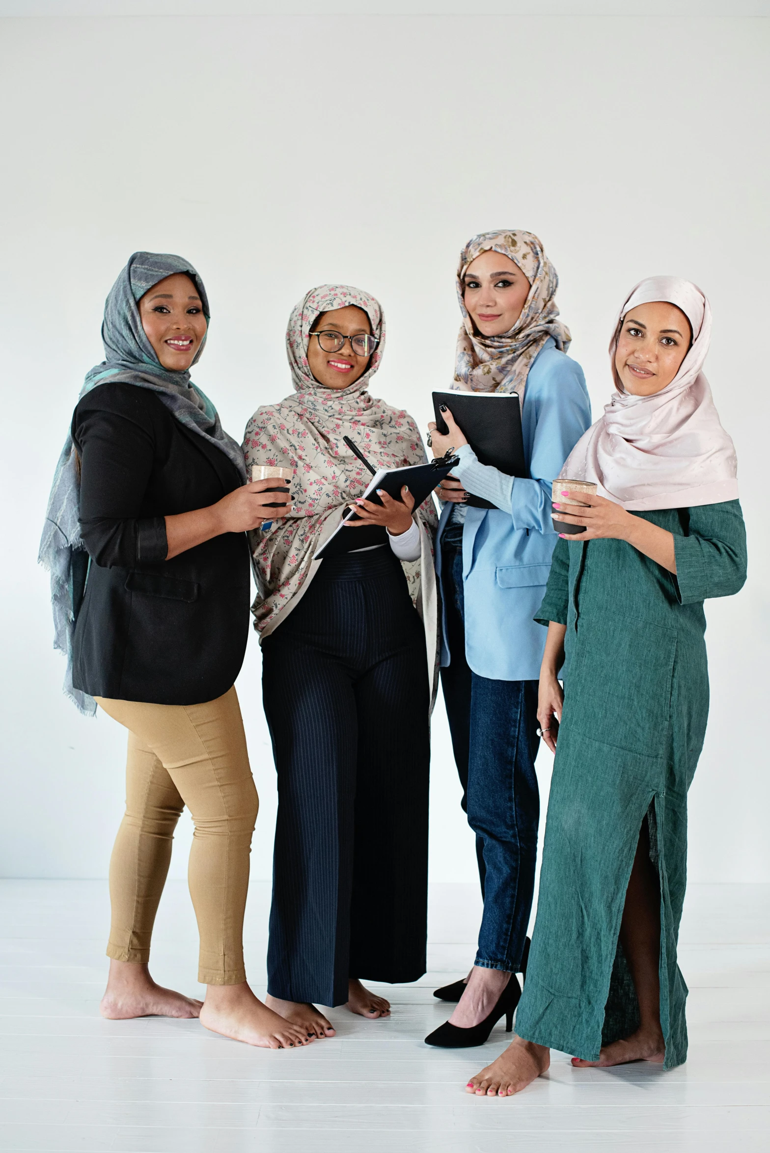 a group of women standing next to each other