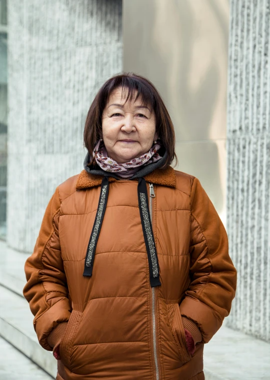 an older woman is smiling for the camera