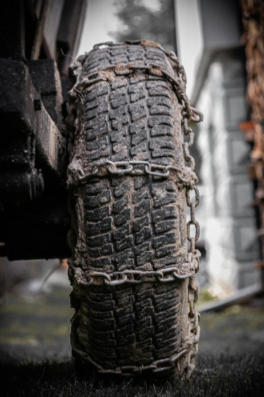 an old worn tire sitting on the ground