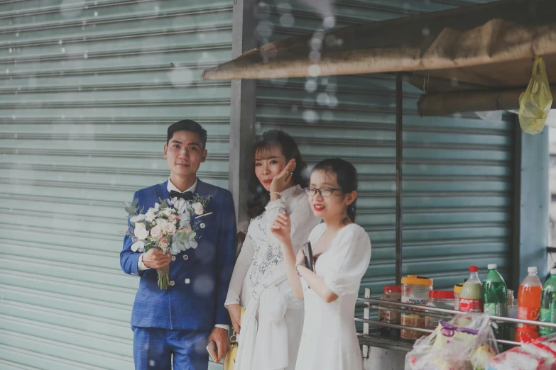 a family posing for a picture at the outside of a bar