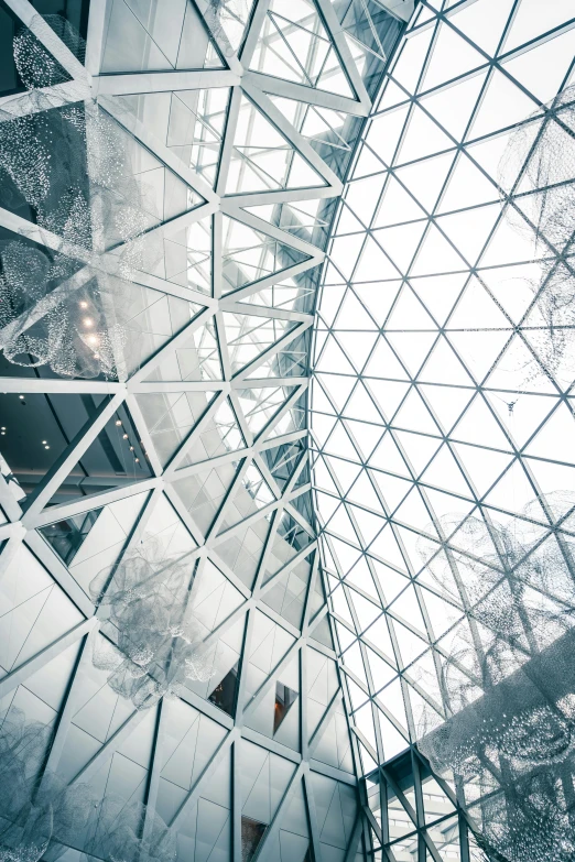 the dome in a glass building with lots of windows