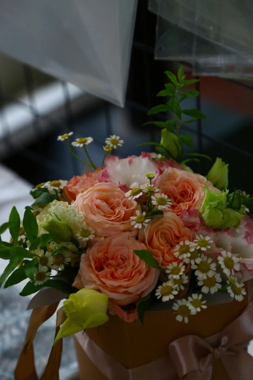 a flower box with flowers inside of it