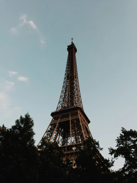the eiffel tower towering over all of paris