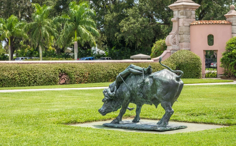a statue of a person in the shape of a bull
