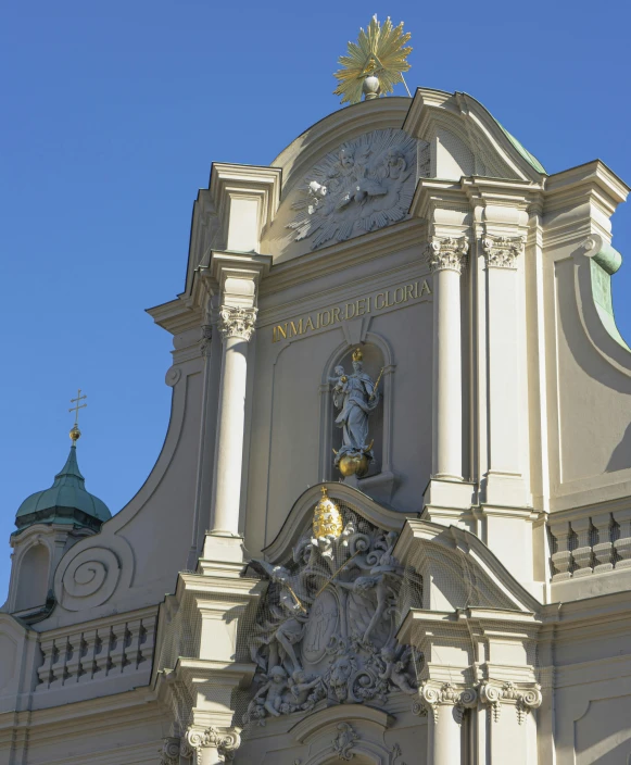 a white building that has a clock on the top