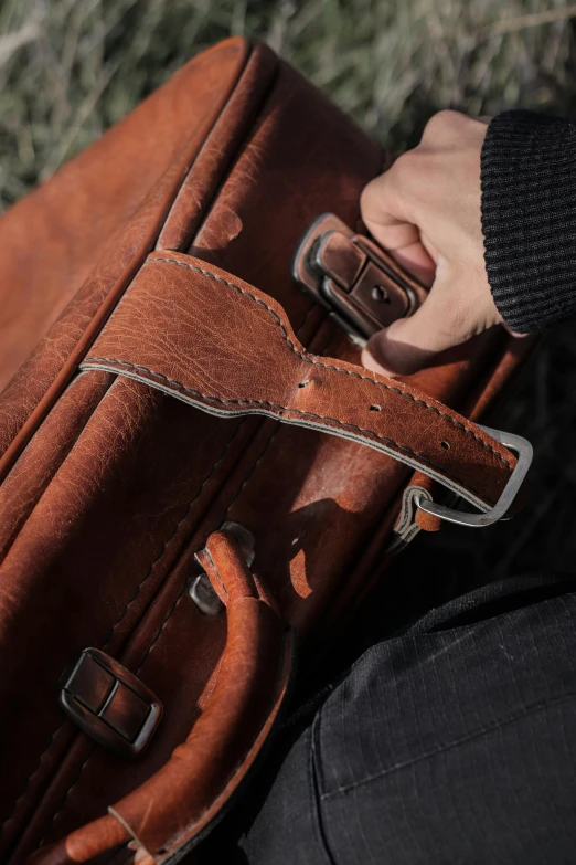 a person is holding the inside side of a brown bag