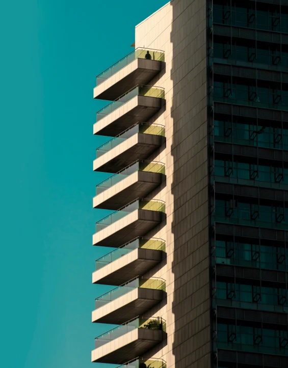 an architectural structure stands high above the surrounding buildings