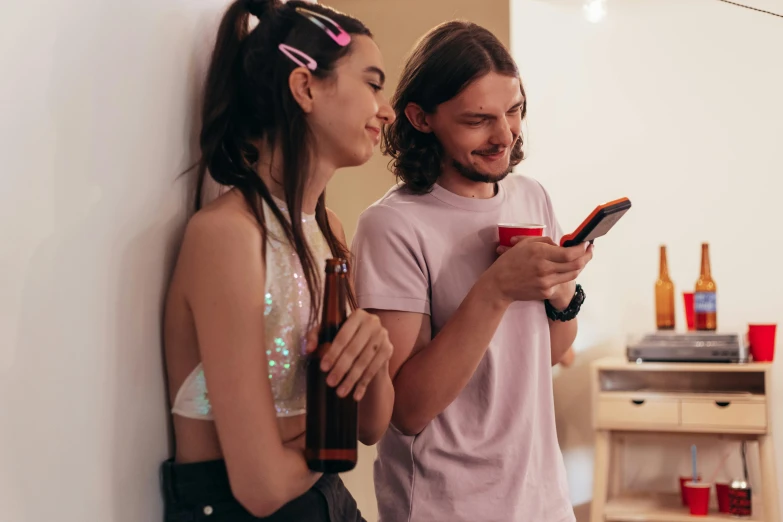 a man and a woman using cell phones