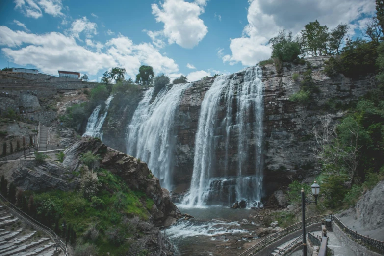 the view shows a waterfall and some steps