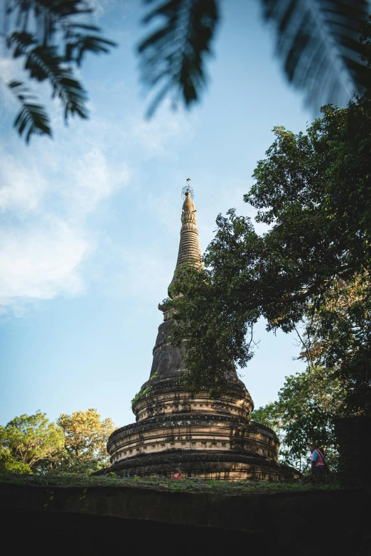 a very tall building with many small spires