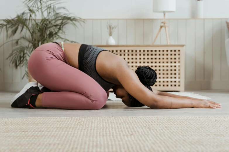 an image of a woman that is doing yoga