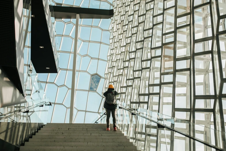 a person walks up some steps in an office building