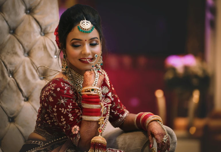 bride wearing a traditional red bridal outfit