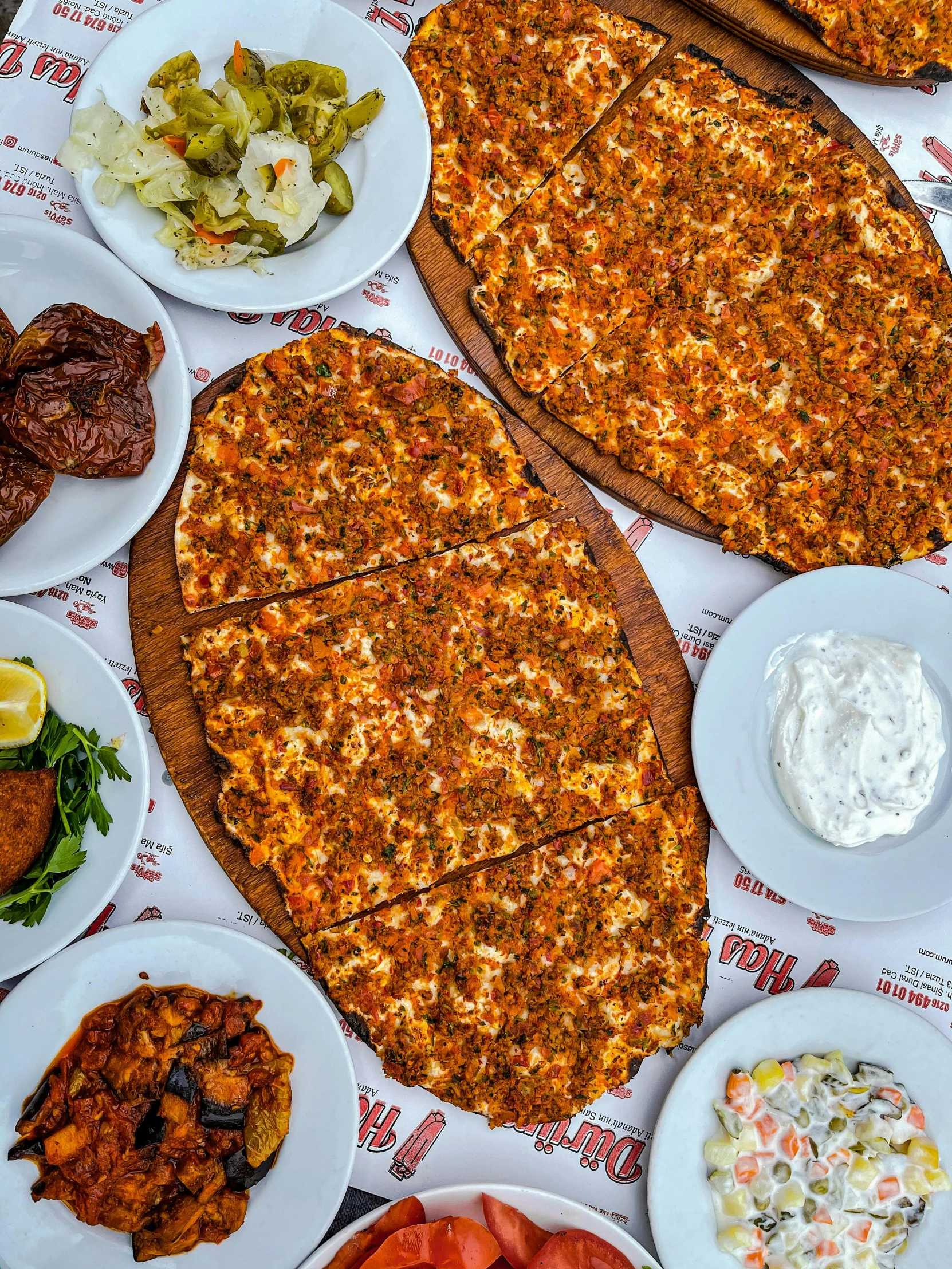 there is a table covered with a bunch of food