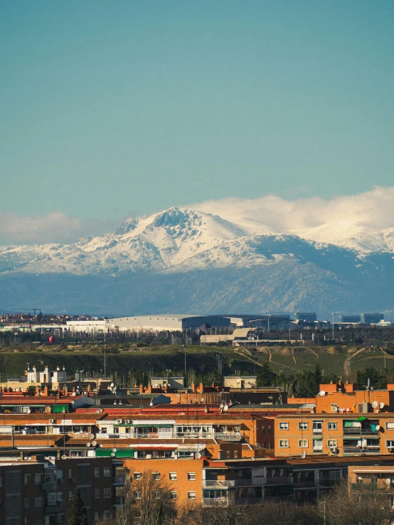 there are mountains and buildings in the area