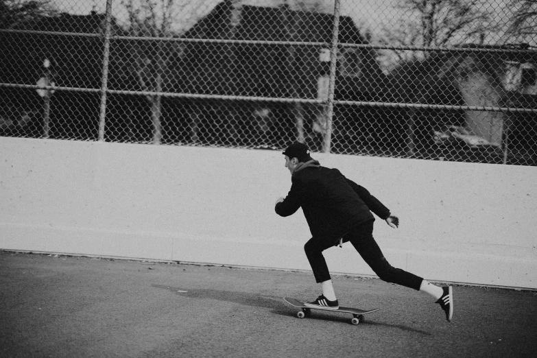 a black and white po of a person on a skateboard