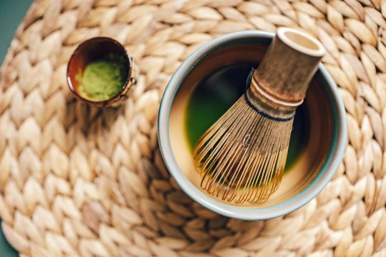 an aerial view of the teacup with an ointment in it