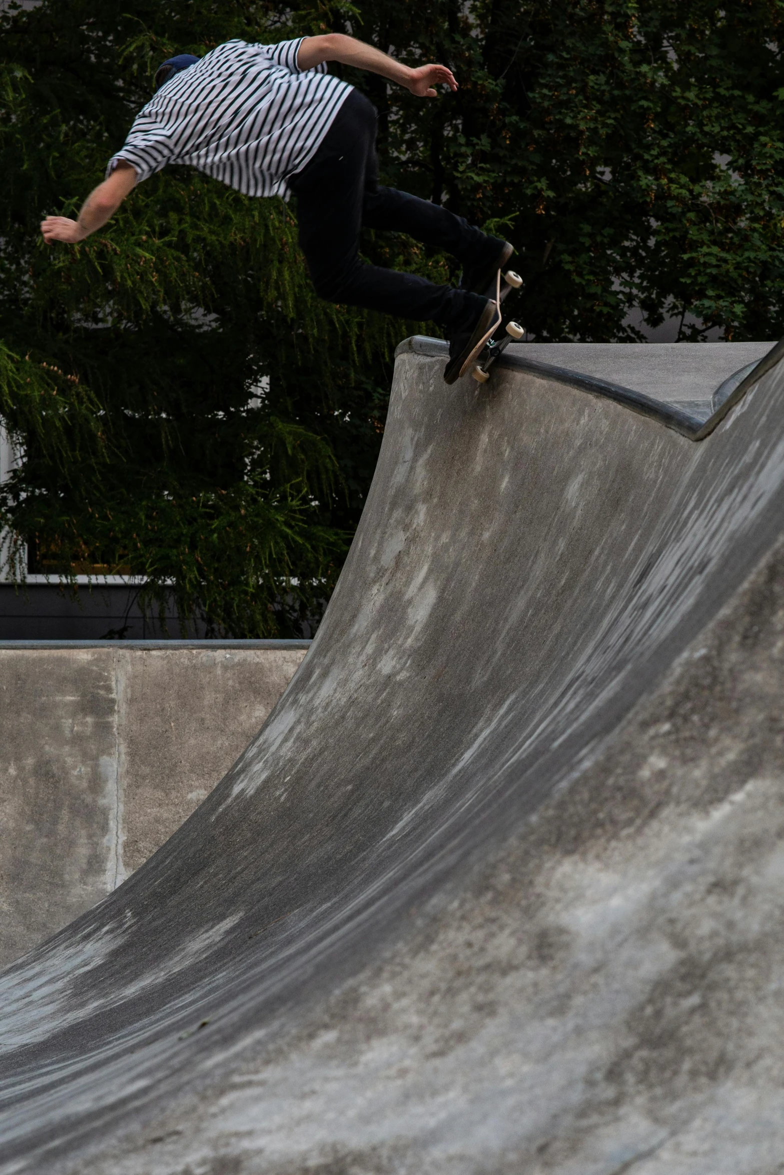 a person riding a skate board at a skate park