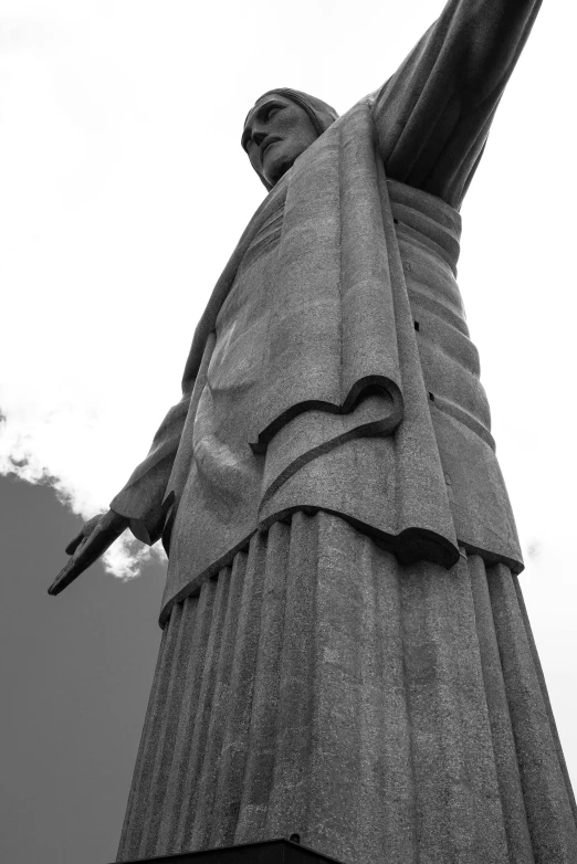 a black and white pograph of the statue of liberty in new york